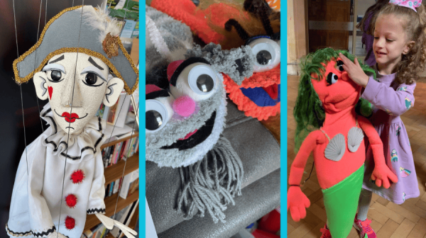 on the left a Pierrot string puppet, in the middle a pair of grey and orange sock puppets with googly ayes and on the far right, a young girl with curly brown hair holding a mermaid UV puppet