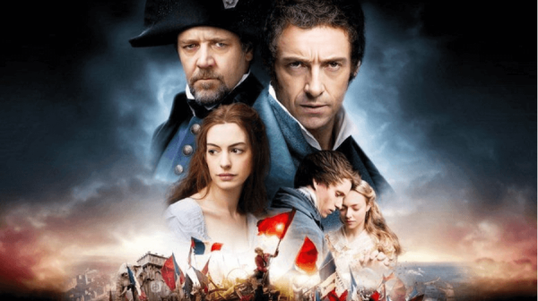 five characters from the film against a background of a dark sky and a scene from the french revolution