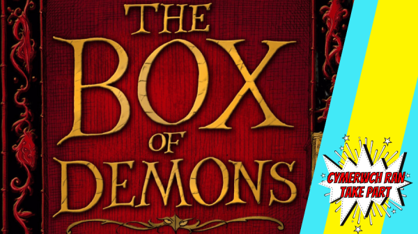 a book cover, in wood like effect, with The Box Of Demons on it, in old fashioned, gold writing 