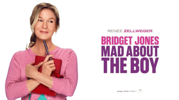 renee zellweger as bridget jones - a white woman with long blonde hair tied back, in a pink cardigan, clutches a red book to her chest and smiles 